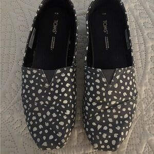 TOMS Black and White Patterned Slip-Ons